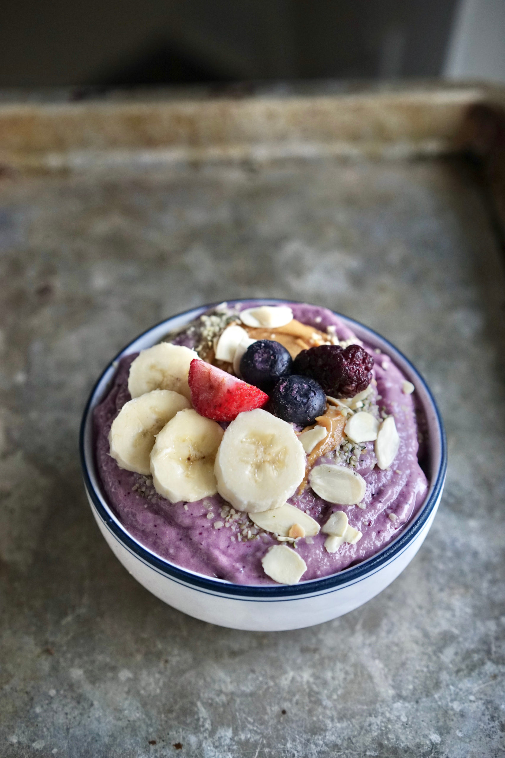 https://www.livinghealthyinseattle.com/wp-content/uploads/2021/03/Peanut-Butter-Berry-Banana-Smoothie-Bowl-5-scaled.jpeg
